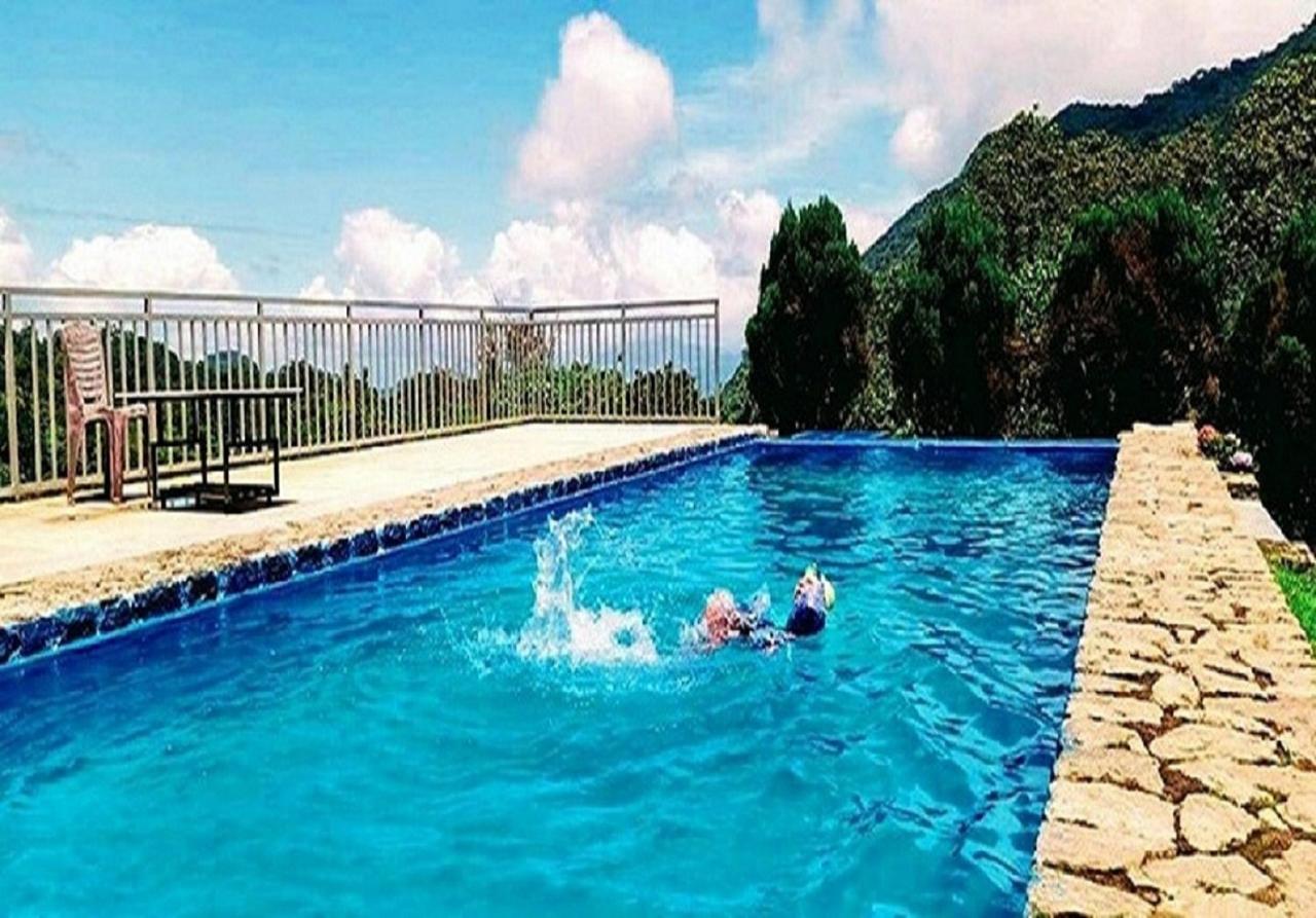 Wild Elephant Eco Friendly Resort Мунар Екстериор снимка